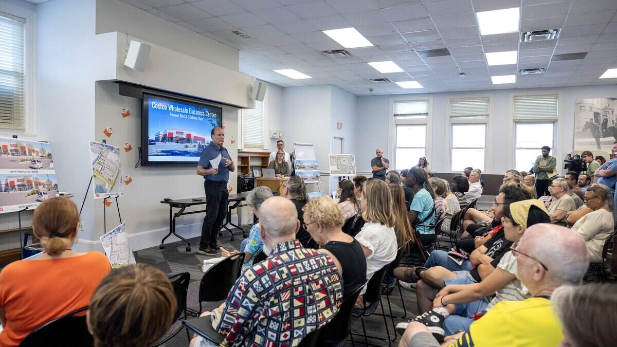 Steven Cross, speaks to community members about the proposed Costco Linwood Business Center zoning changes during a public meeting at the Westport Library Tuesday, July 7, 2026, in Kansas City.