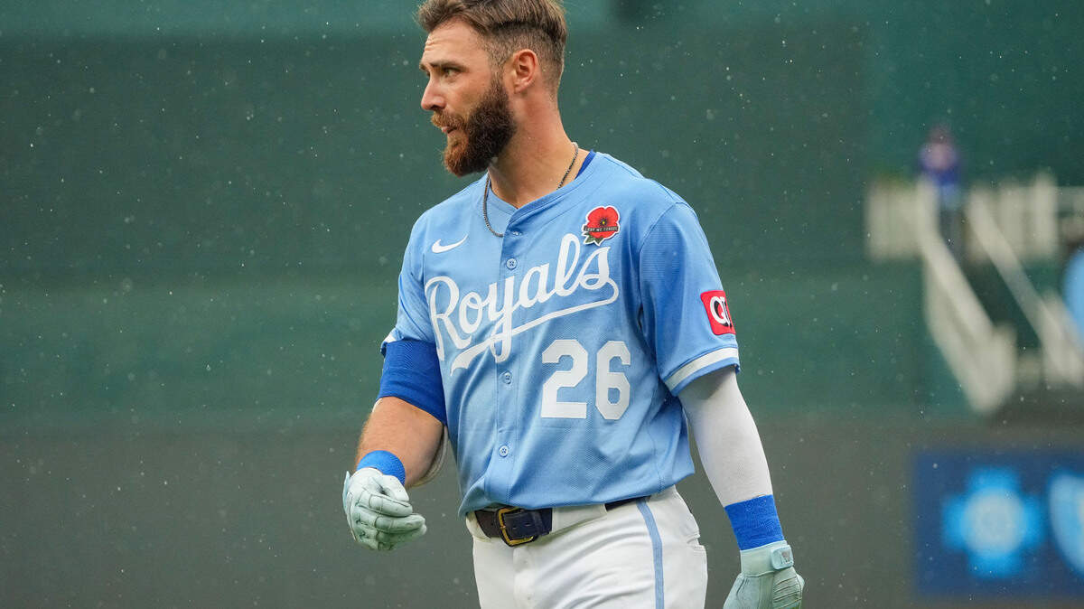 Kansas City Royals right fielder John Rave returned to the dugout against the Cincinnati Reds in the seventh inning of Monday’s game at Kauffman Stadium.
