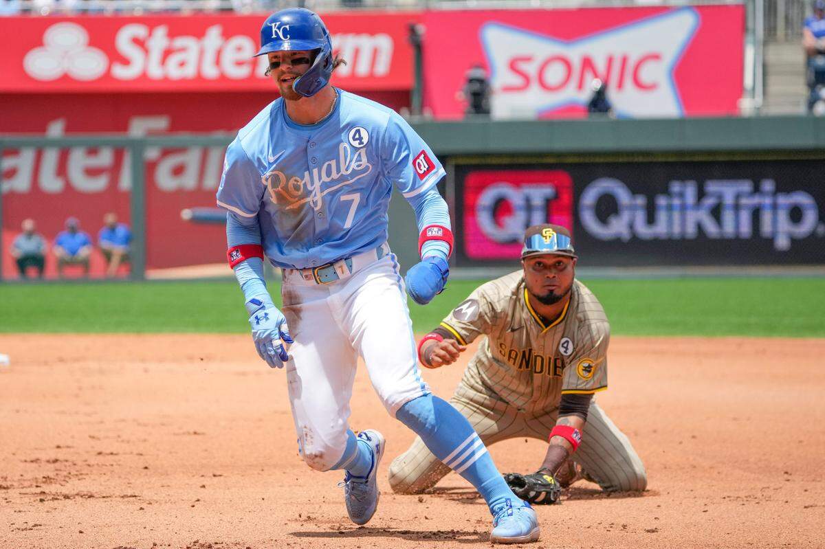 San Diego Padres second baseman Luis Arraez tags out Kansas City Royals shortstop Bobby Witt Jr. to end a fourth-inning rundown on Sunday at Kauffman Stadium.