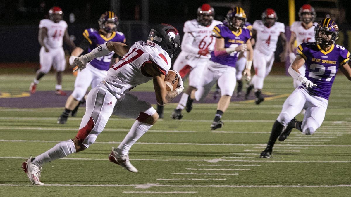 Park Hill’s Jaylin Noel (left) carried the ball up field in the game at Blue Springs on Friday night, Oct. 30. 2020.