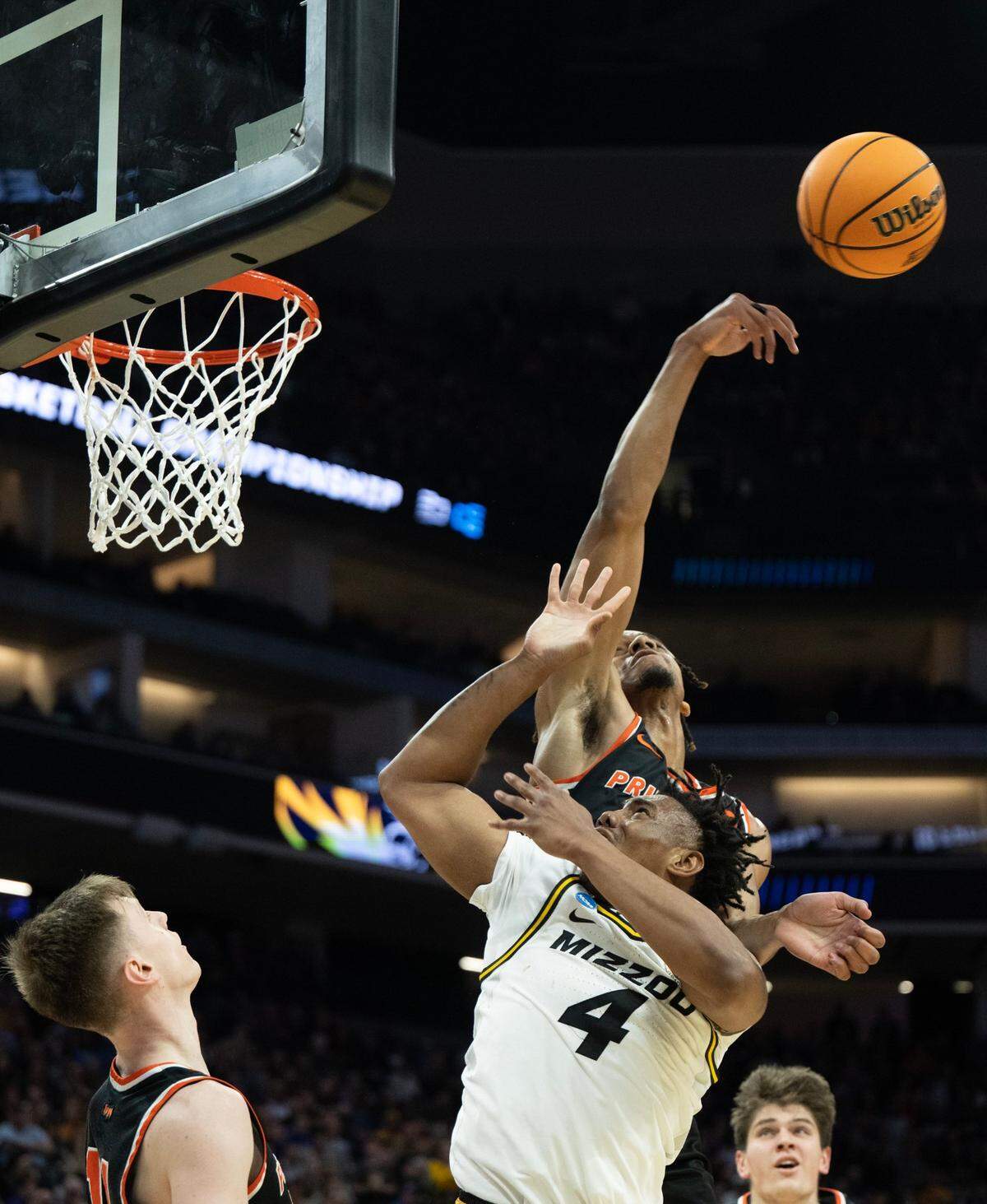 Princeton Tigers forward Tosan Evbuomwan (20) knocks the ball away from Missouri Tigers guard DeAndre Gholston (4) during a game in the NCAA Tournament at Golden 1 Center in Sacramento, Saturday, March 18, 2023.