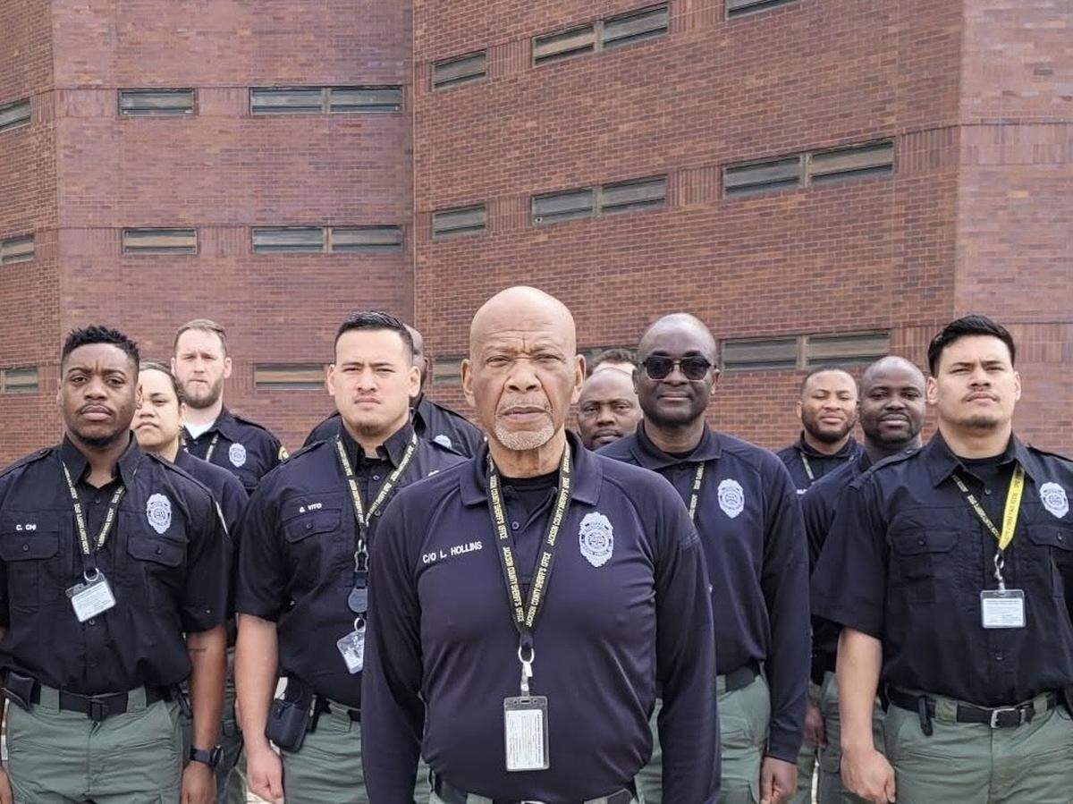 Larry Hollins (front and center) served as a correctional officere at the Jackson County Detention Center for decades, mentoring both guards and inmates throughout his life.