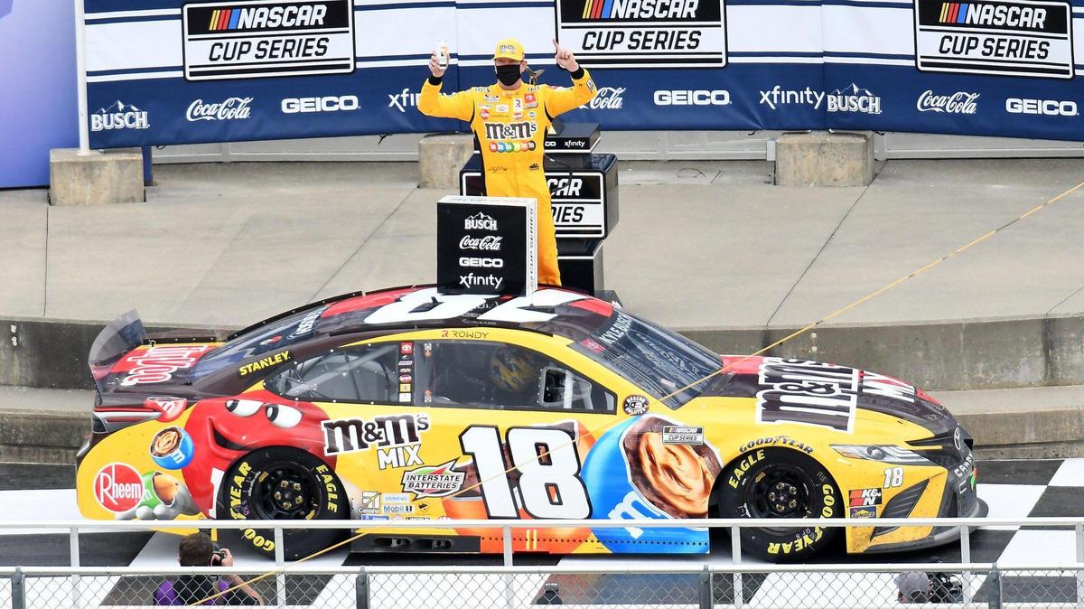 Kyle Busch celebrates in Victory Lane after winning the NASCAR Cup Buschy McBusch Race 400 at Kansas Speedway Sunday, May 2, 2021.