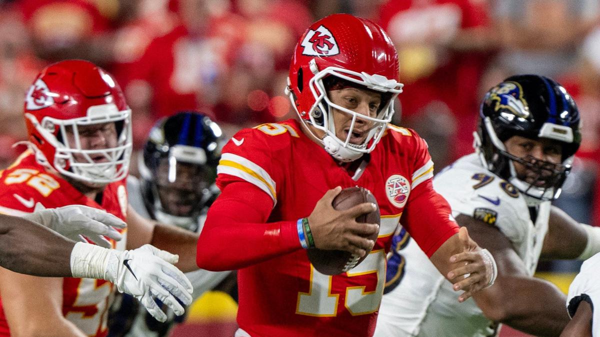 Kansas City Chiefs quarterback Patrick Mahomes (15) scrambles against the Baltimore Ravens in the first half on Thursday, Sept. 5, 2024, at GEHA Field at Arrowhead Stadium.