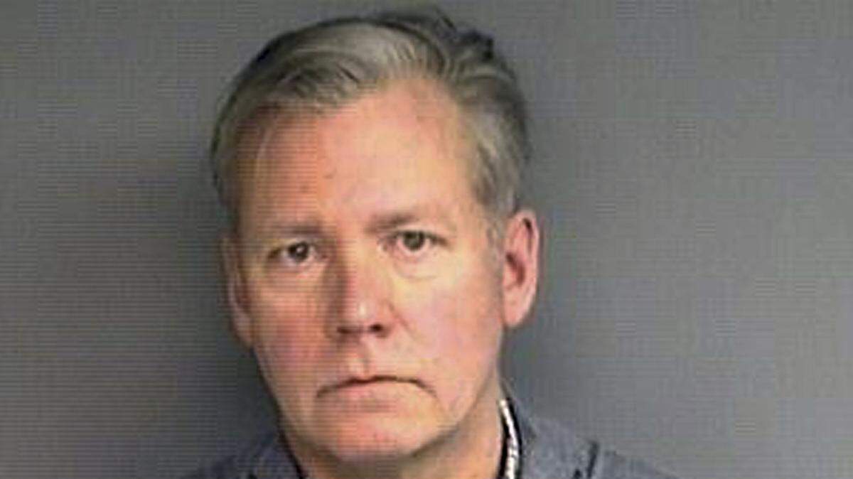 This booking photograph released Wednesday, Jan. 16, 2019, by the Stamford, Conn., Police Department shows Chris Hansen, former host of the television program “To Catch a Predator,” arrested Monday in his hometown of Stamford, on charges he he wrote bad checks for $13,000 worth of marketing materials. (Stamford Police Department via AP)