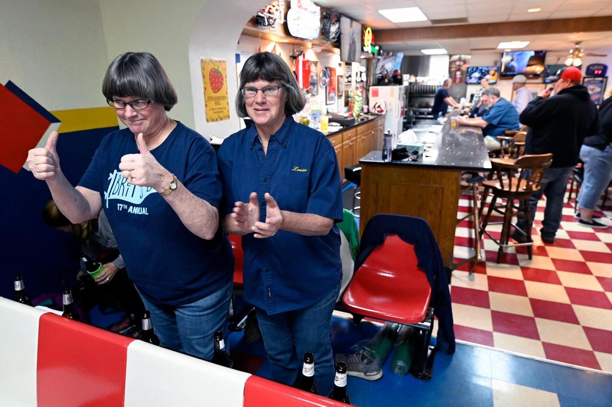 Linda Verbeck, left, and her twin sister, Louise Sachen, have been bowling at the club for the past 37 years. 