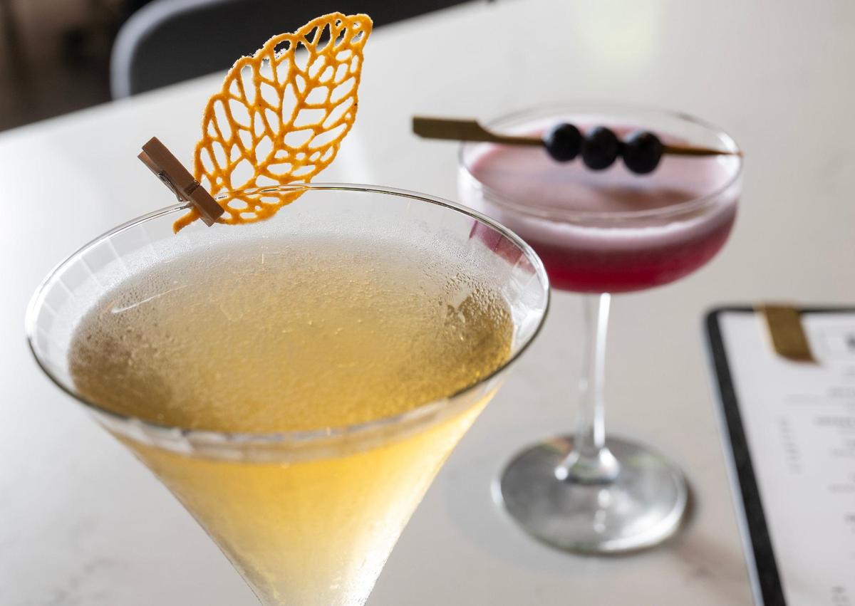 A delicate leaf made of Parmesan cheese garnishes a cacio e pepe martini at Osteria Bianchi.