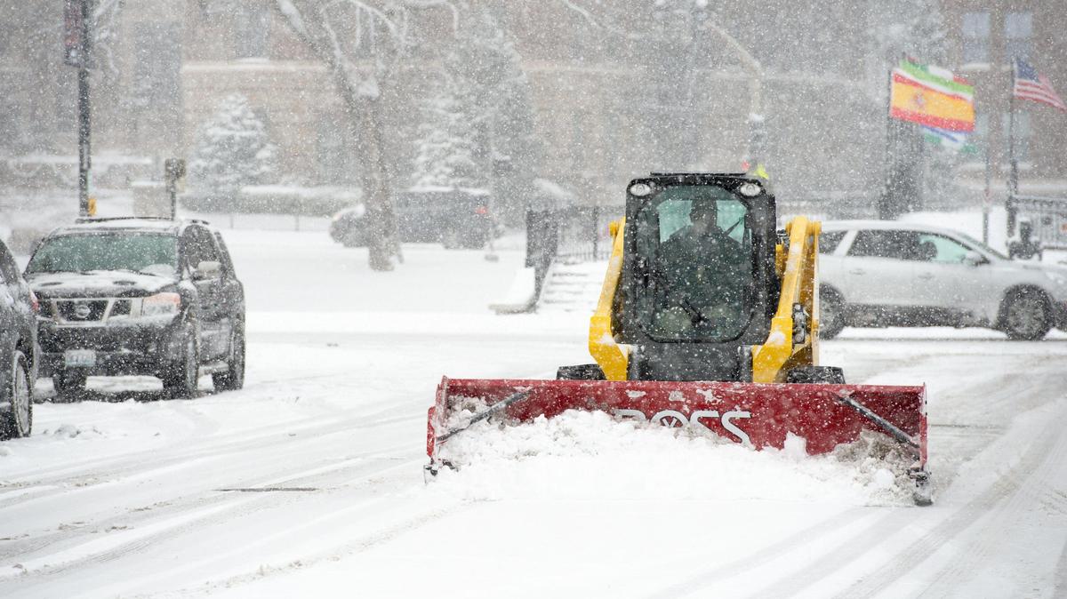 A plow truck works on the Country Club Plaza in 2019. Kansas City is expected to get 3 to 6 inches of snow this weekend.
