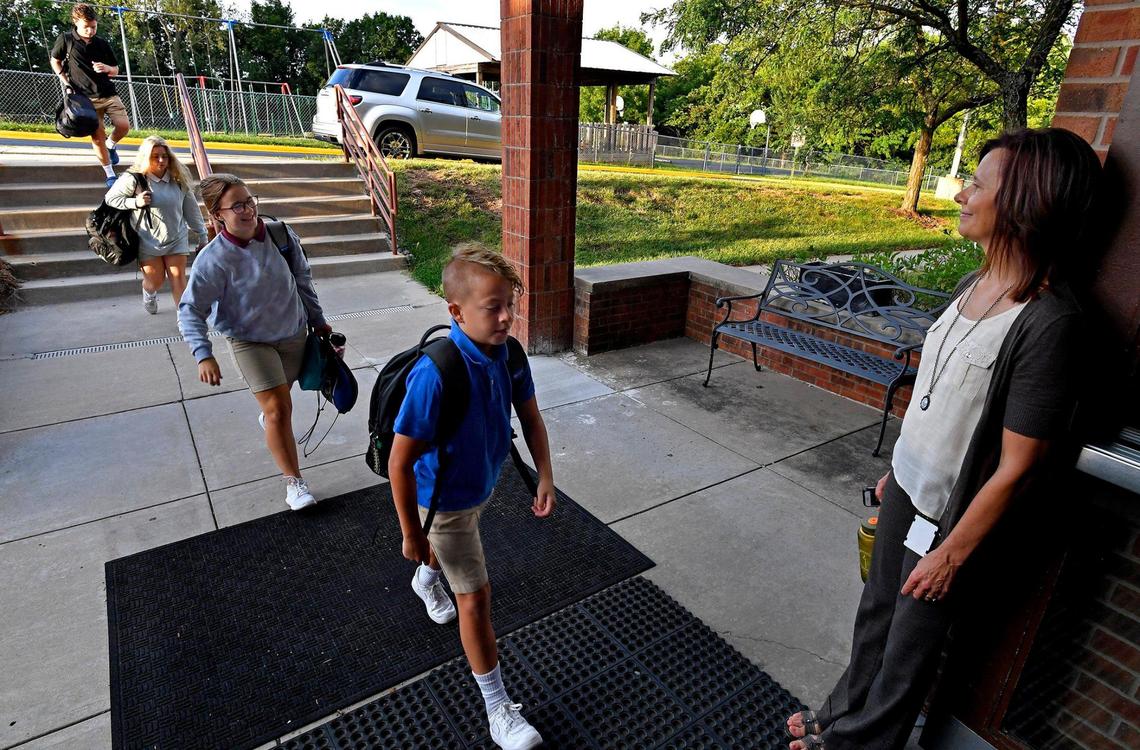 Students enter Maranatha Christian Academy in Shawnee, one of the several private schools in the Kansas City metro that have left masks optional this year.