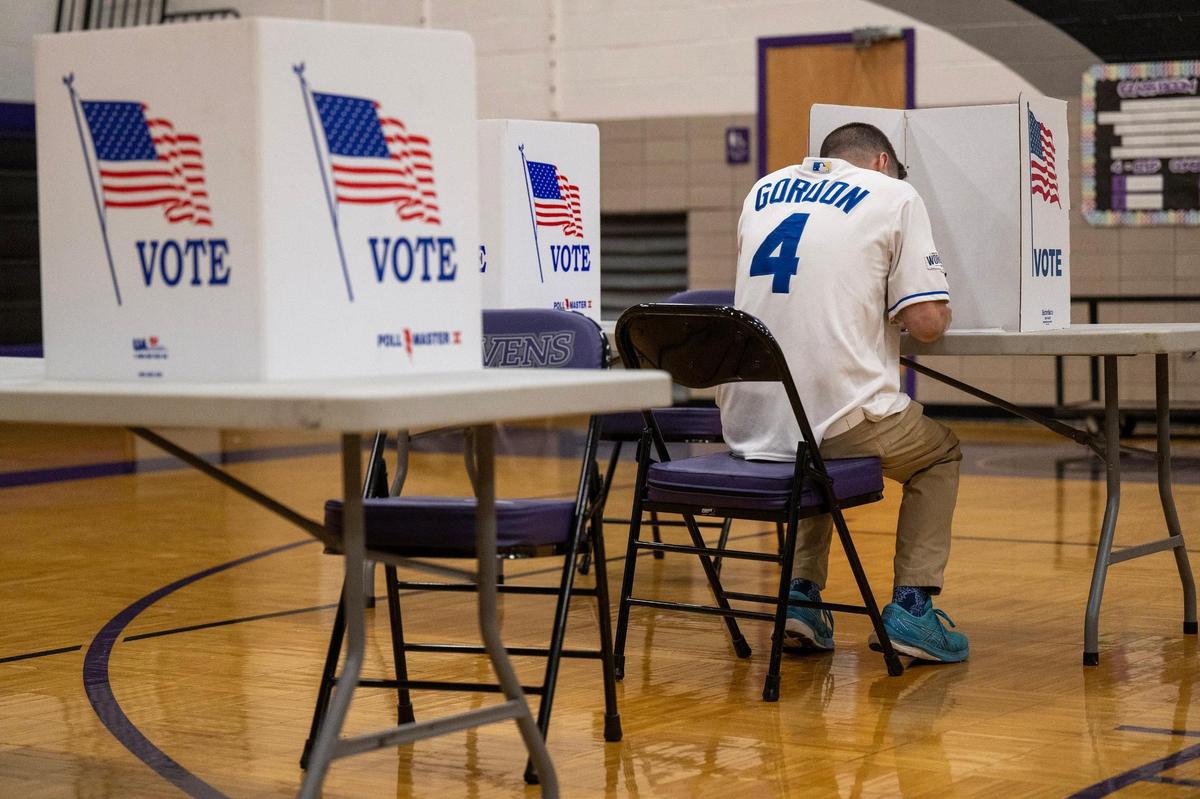 Raytown resident Joe Summers cast his ballot Tuesday, April 2, 2024, at Raytown Central Middle School. Jackson County voters went to the polls to decide on many races but most notably Question 1, which would authorize tax funding to help pay for a new Royals stadium in the Crossroads and renovations to Arrowhead Stadium.