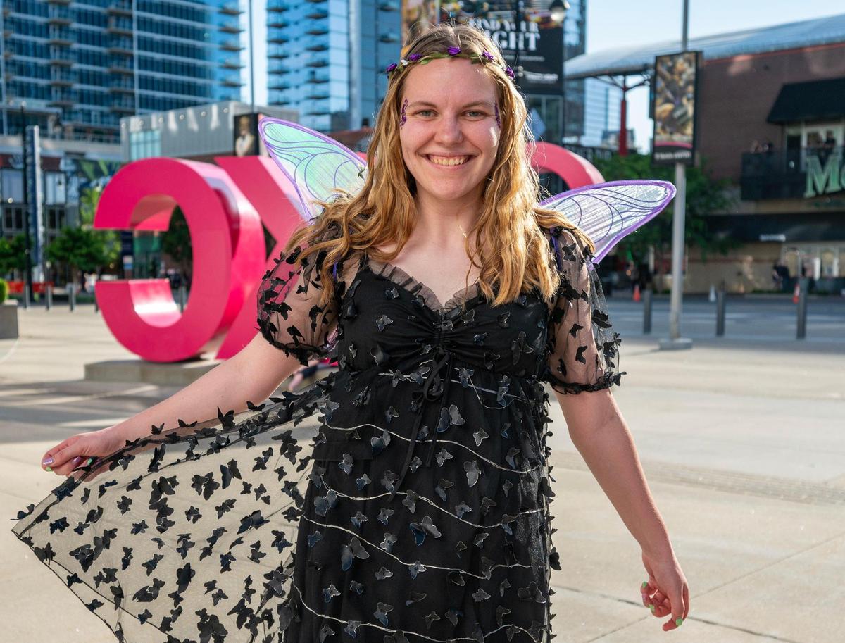 Mikala Steinmann, of Rochester, N.Y., poses for a portrait in her butterfly outfit while waiting in line for Katy Perry’s Lifetimes Tour at the T-Mobile Center on Saturday, May 10, 2025, in Kansas City.