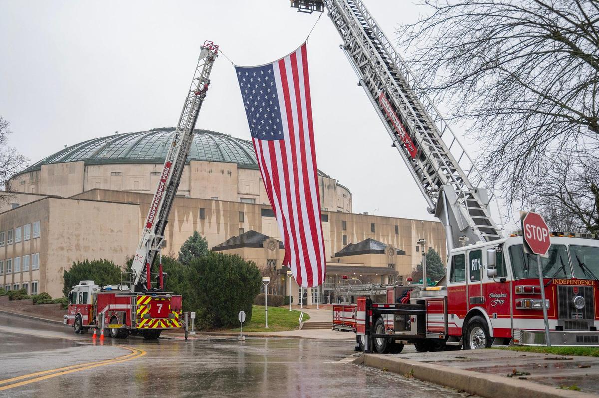 A U.S. flag is displayed in tribute to fallen Independence police officer Cody Allen during a visitation at Community of Christ Auditorium on Thursday, March 7, 2024, in Independence. Allen, 35, a husband and father of two children, was shot and killed last Thursday during an eviction.