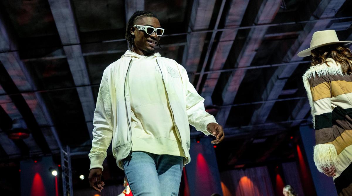 Kansas City Chiefs wide receiver Rashee Rice models Chiefs clothing during the 12th annual Chiefs Style Lounge on Tuesday, Oct. 17, 2023, in Kansas City.