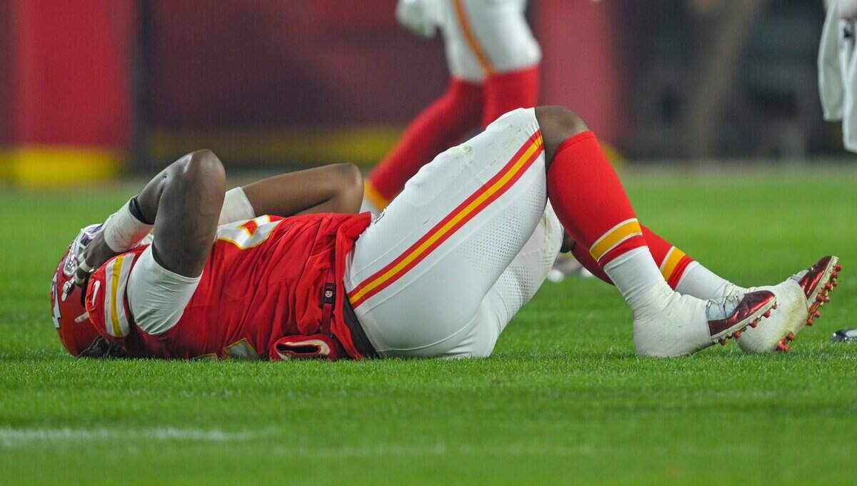 Kansas City Chiefs tackle Wanya Morris (64) gets injured in the first play against the Houston Texans at GEHA Field at Arrowhead Stadium on Sunday, Dec. 7, 2025.