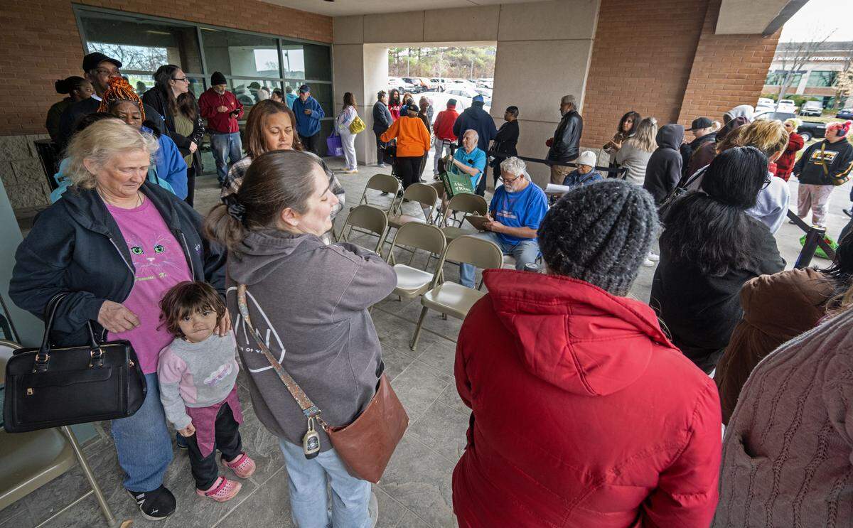 A large crowd turned out for Harvester’s food distribution at Jackson County Public Health in Lee’s Summit on Wednesday, November 19, 2025. The event is to address food insecurity by providing essential groceries to residents.