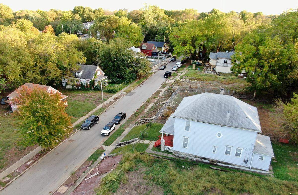 Ron and Barread Peters moved from Houston and bought a home in the Key Coalition neighborhood, one they see changing. Their green bungalow, at the top center of the photo, faces west looking onto Garfield Avenue.
