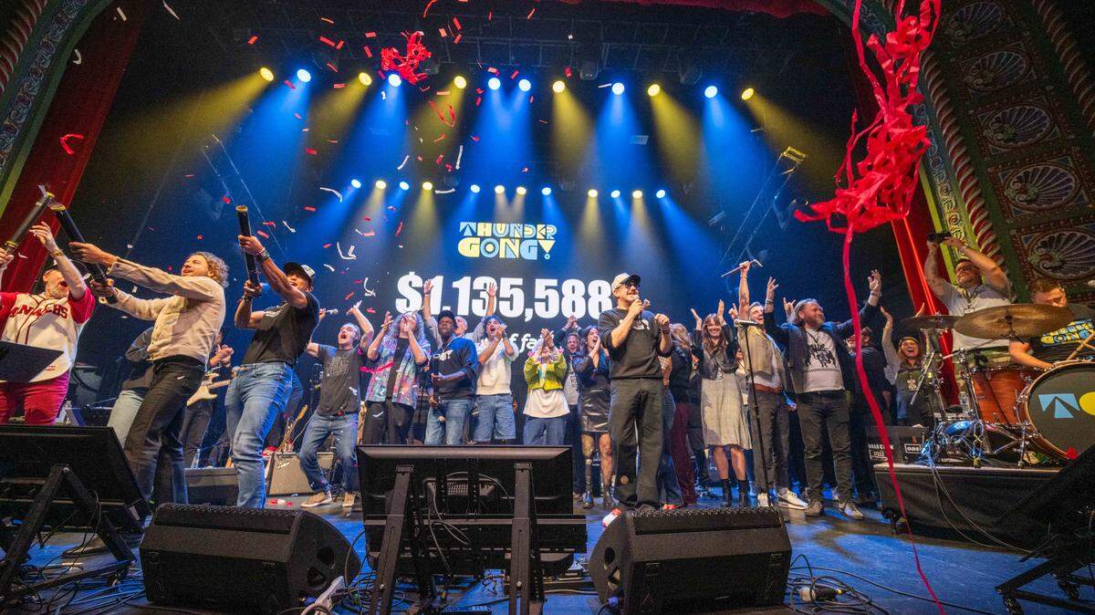 Performers and fans celebrate exceeding the fundraising goal for Thundergong! on Saturday, November 8, 2025, at Uptown Theater in Kansas City. The annual fundraiser was hosted by Jason Sudeikis and featured live music performances and moments of comedy.