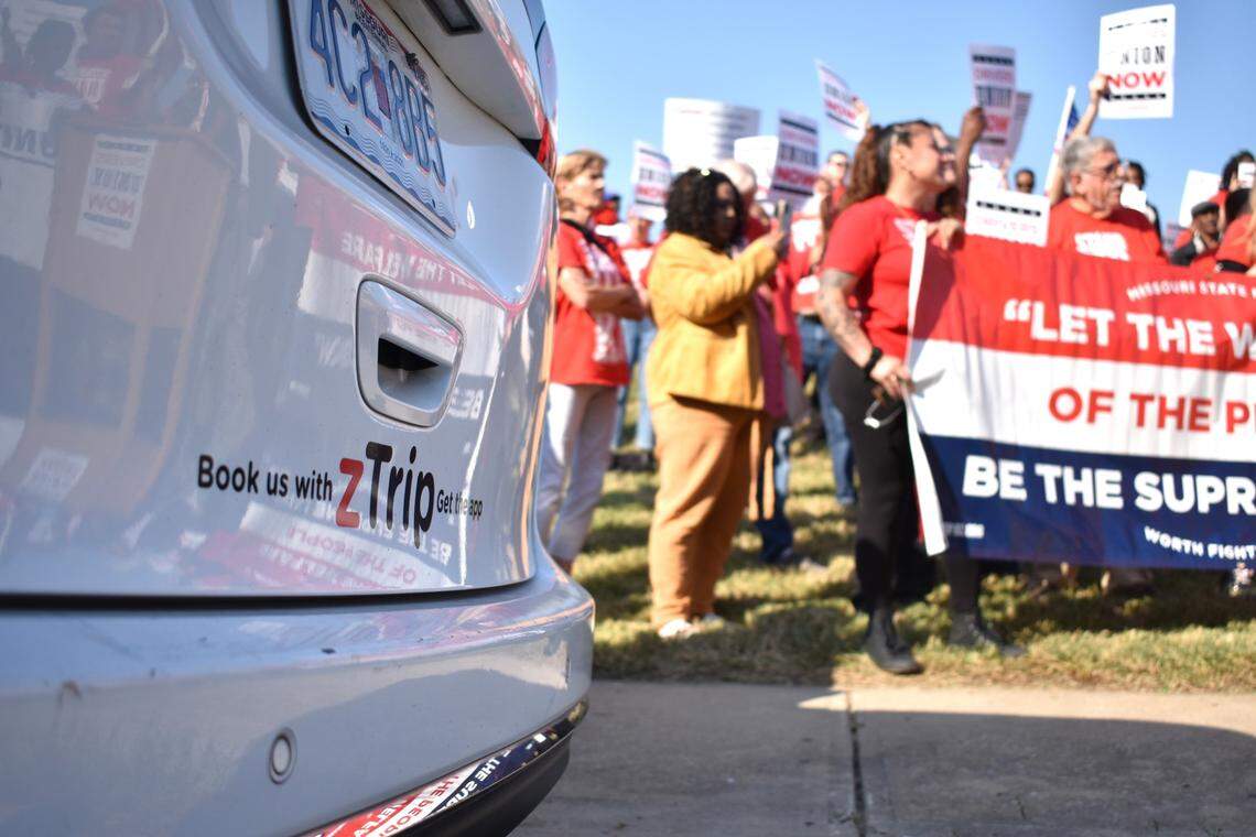 IRIS microtransit drivers and union allies rally outside program operator zTrip’s headquarters on Kansas City’s East Side on Thursday, Oct. 10, 2024.