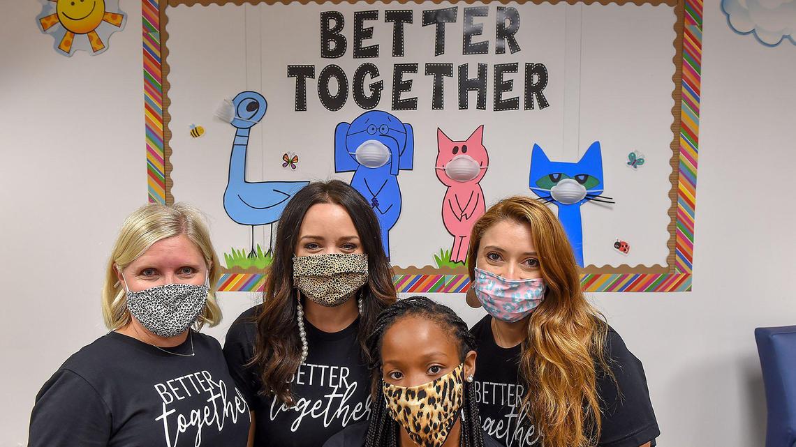 Kindergarten teachers, from left, Kristen Jones, Ariel Puccetti, Kylie Washington and Kellie Flick, a virtual education kindergarten teacher, worked collaboratively to prepare education plans for students attending hybrid in-person classes and virtual learning as the school year began Sept. 9 amid the COVID-19 pandemic at Oak Hill Elementary School in Overland Park in the Blue Valley school district.