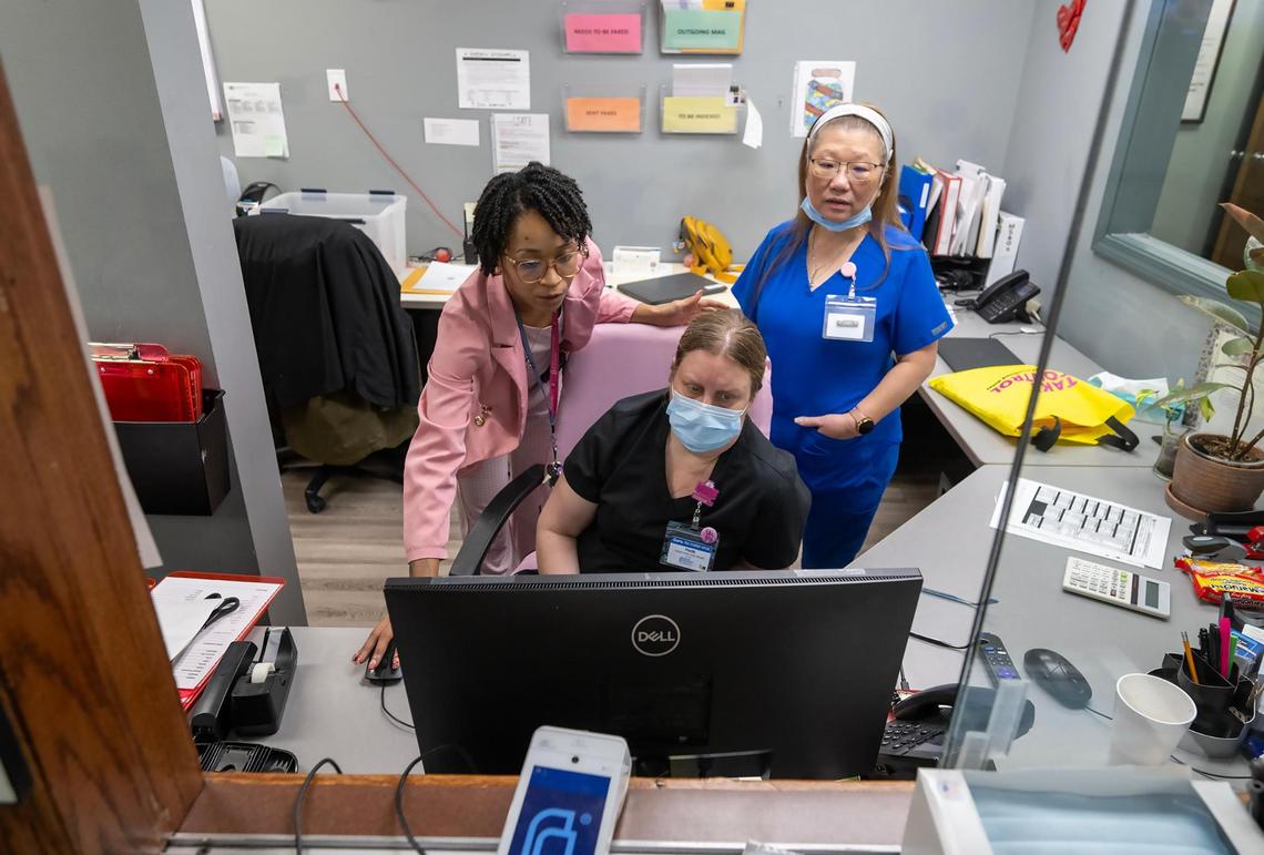 Shana Torell, Health Center manager, from left, Priscilla Jones, assistant Health Center manager, and Nancy McQuillan, right, reproductive health assistant, discuss patient scheduling on Saturday, Fe. 15, 2025, at Planned Parenthood Great Plains in Kansas City. For the first time in about 15 years, the facility returned to providing procedural abortions in Kansas City.
