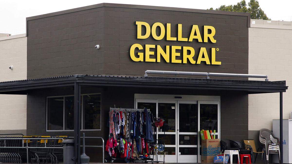 FILE- In this Aug. 3, 2017, file photo the Dollar General store is pictured in Luther, Okla. Dollar General reports financial results Thursday, Aug. 29, 2019. (AP Photo/Sue Ogrocki, File)