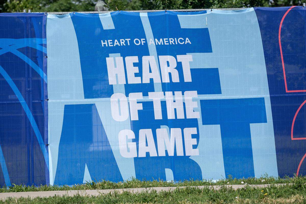 A banner is displayed on fencing surrounding the FIFA Fan Festival site at the National WWI Museum and Memorial on Wednesday, May 27, 2026, in Kansas City.