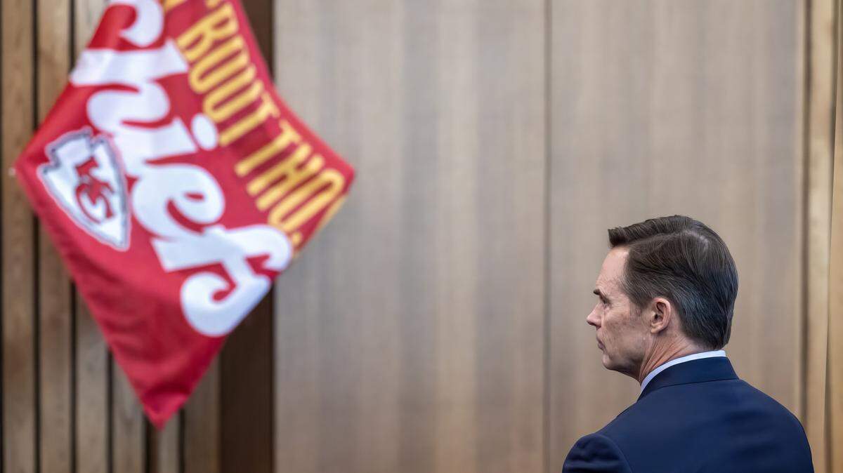 Mark Donovan, President, Kansas City Chiefs, looks on and listens as Kansas Gov. Laura Kelly, announces the Chiefs' relocation to Kansas City, Kansas, during an event on Monday, Dec. 22, 2023 in Topeka Kansas. 