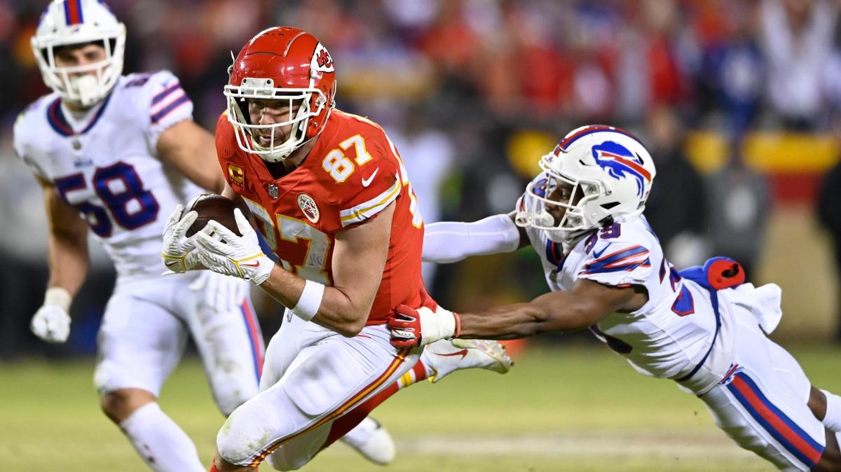 Kansas City Chiefs tight end Travis Kelce ran for a first down during overtime of the AFC Divisional playoff game against Buffalo on Sunday, Jan. 23, 2022, at Arrowhead Stadium in Kansas City. The Chiefs defeated the Bills, 42-36 in overtime.