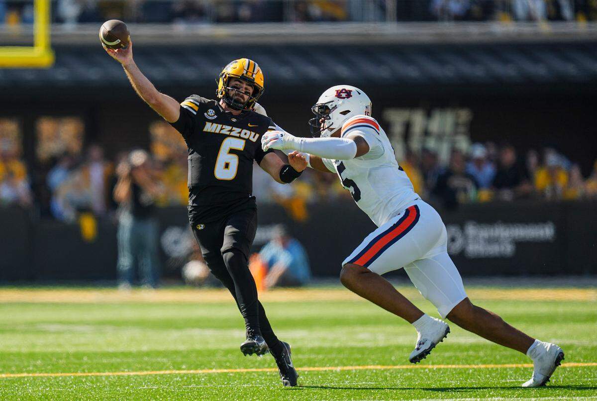 Missouri Tigers quarterback Drew Pyne throws a pass during Saturday’s game at Faurot Field at Memorial Stadium.