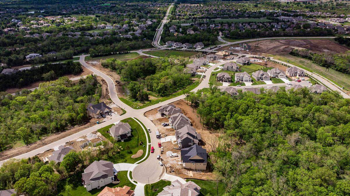 Escape to the tranquility of Timber Rock, a nature-focused community in the heart of Lenexa that features heavily wooded homesites, as well as homes priced from the upper $500,000s.