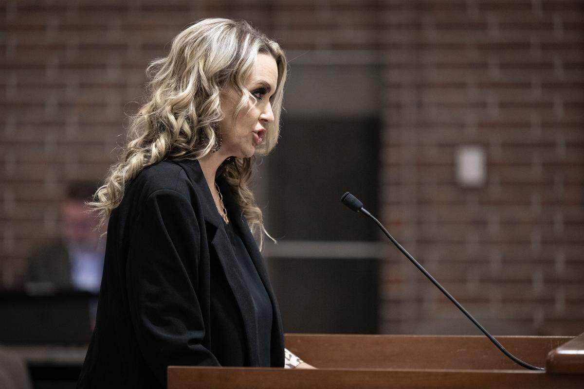 Toni Skelton of Prairie Village, the owner of a pet spider monkey, addresses the Prairie Village City Council, during a meeting Monday, Jan. 5, 2025, as officials weigh new ordinance language regarding exotic pets in the city. Skelton's monkey could potentially be grandfathered in under the new proposal.