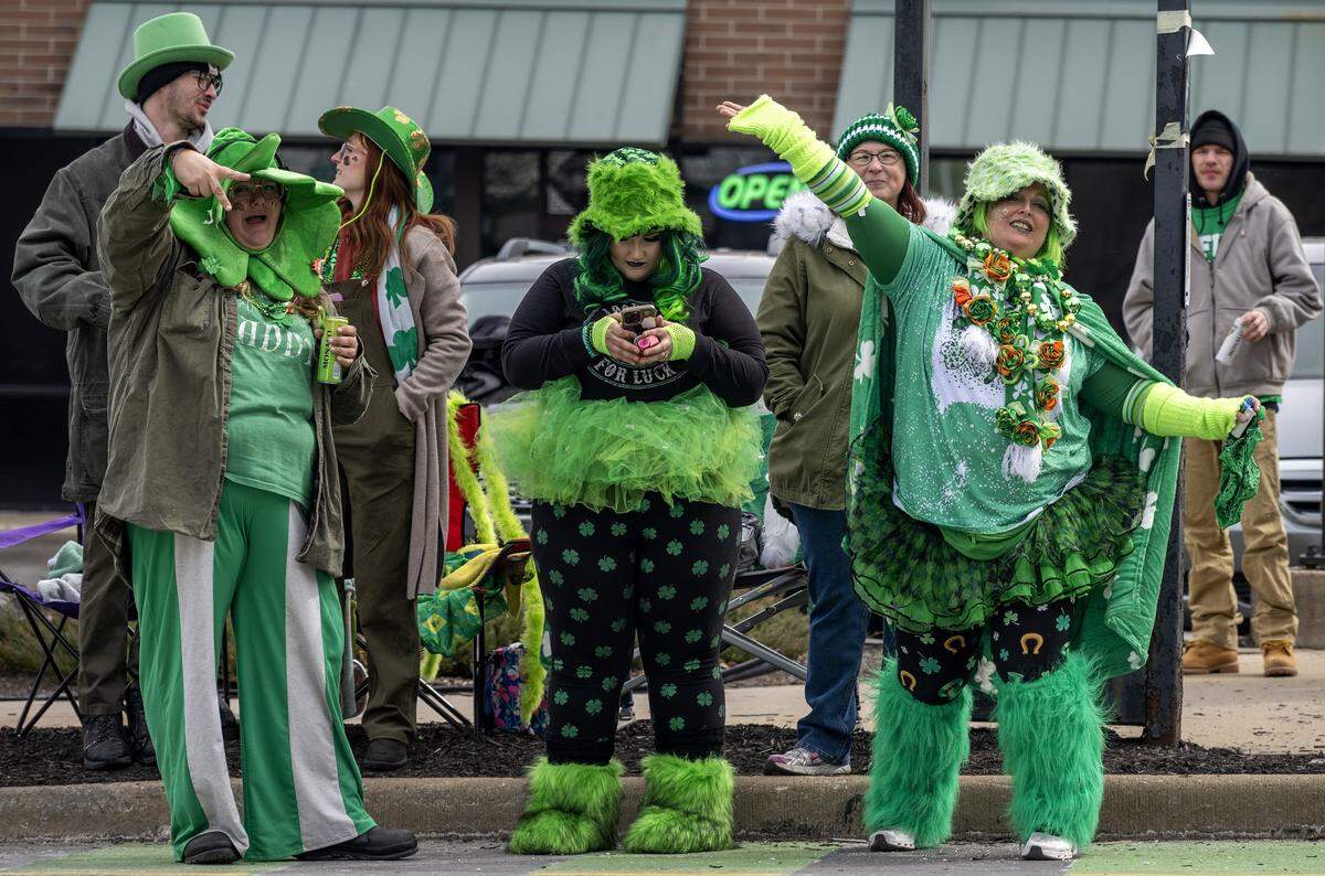 Parade attendees wear festive attire during the St. Patrick's Day parade on Tuesday, March 17, 2026, in Kansas City.