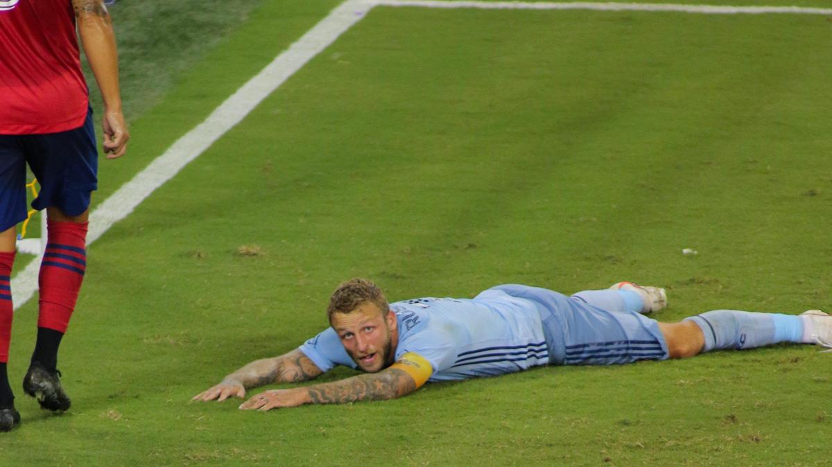 Johnny Russell looks up from the pitch after a near miss on goal for Sporting Kansas City Wednesday night against FC Dallas at Children’s Mercy Park. Sporting KC could not find a game winner in the second half as the game ended 1-1.