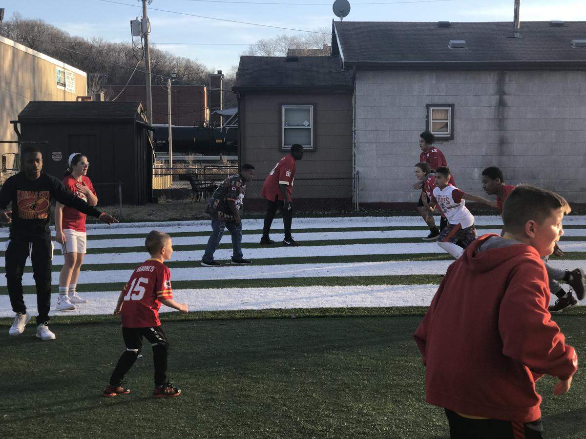 Members of the Missouri Wolverines youth football club in Kansas City’s East Bottoms spent most of the Super Bowl game playing football at their training facility on Sunday.