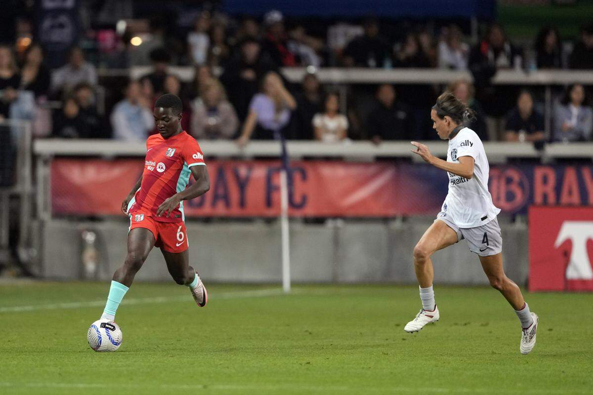 Kansas City Current forward Temwa Chawinga, left, controls the ball against Bay FC defender Emily Menges during Saturday night’s NWSL match at PayPal Park in San Jose, Calif.