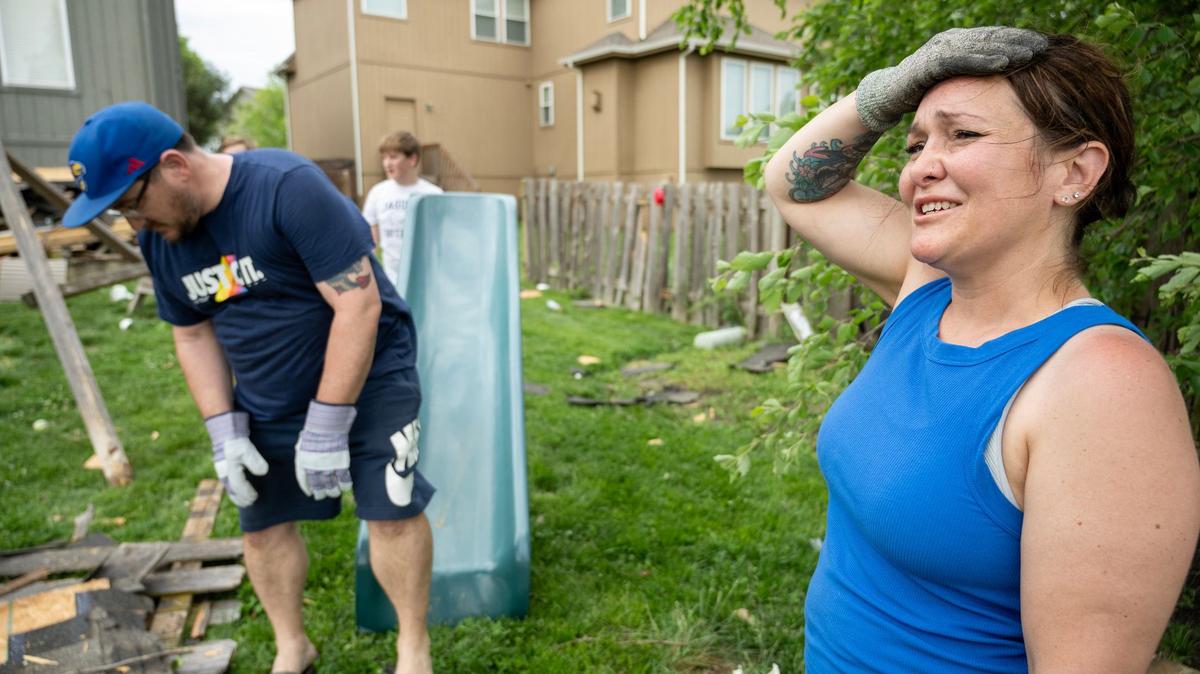 Herschel and Rebecca McWilliams were cleaning up Monday after a tornado hit Sunday night near their home adjacent to Mill Valley High School in Shawnee, Kansas. The couple and their four children were home in bed when the storm hit. “It could’ve been so much worse,” said Rebecca McWilliams. No sirens went off during the storm, McWilliams said.