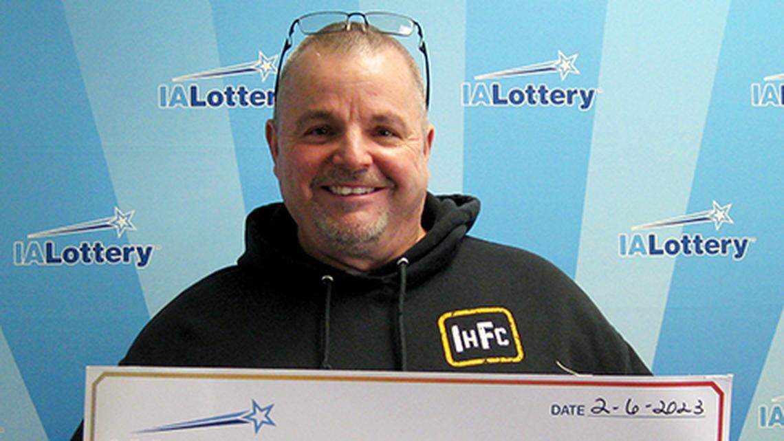 Mark Dann with his big $50,004 check.