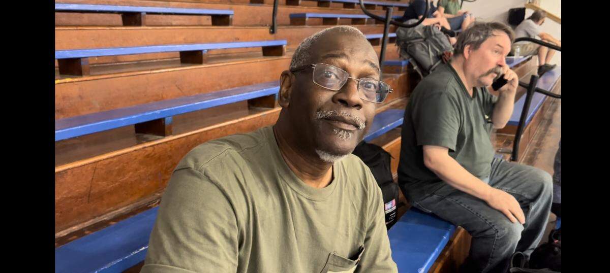 Larry Brown of Atlanta said he was traveling the country by rail in recent days when he was caught up in the crash. He was among the passengers brought to Northwestern High School after the wreck. 