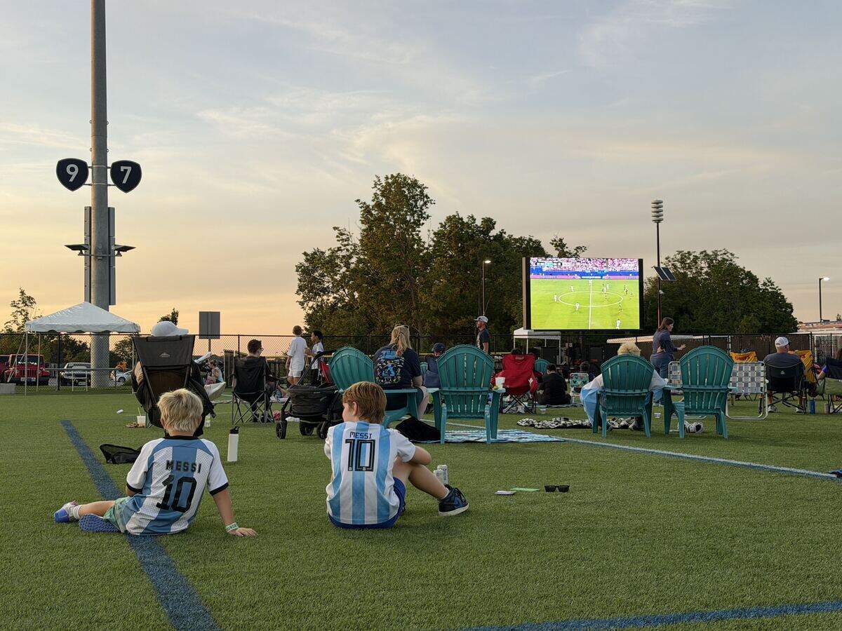 Go North KC’s watch party at the Central Bank Sporting Complex on June 16, 2026, which attracted around 1,000 people — many wearing soccer garb — was full of children playing makeshift soccer matches, families posing for photos in front of giant FIFA World Cup-themed soccer balls and people cheering as either team scored.