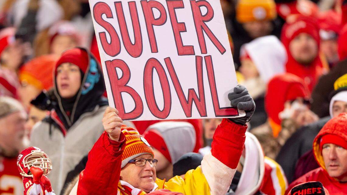 A Kansas City Chiefs fan holds up a sign reading “Super Bowl” after the Chiefs defeated the Cincinnati Bengals 23-20 in the AFC Championship in January.