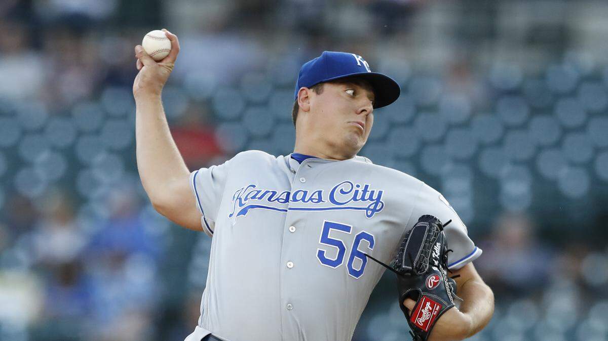 Kansas City Royals starting pitcher Brad Keller throws during the first inning of a baseball game against the Detroit Tigers, Friday, Aug. 9, 2019, in Detroit. (AP Photo/Carlos Osorio)
