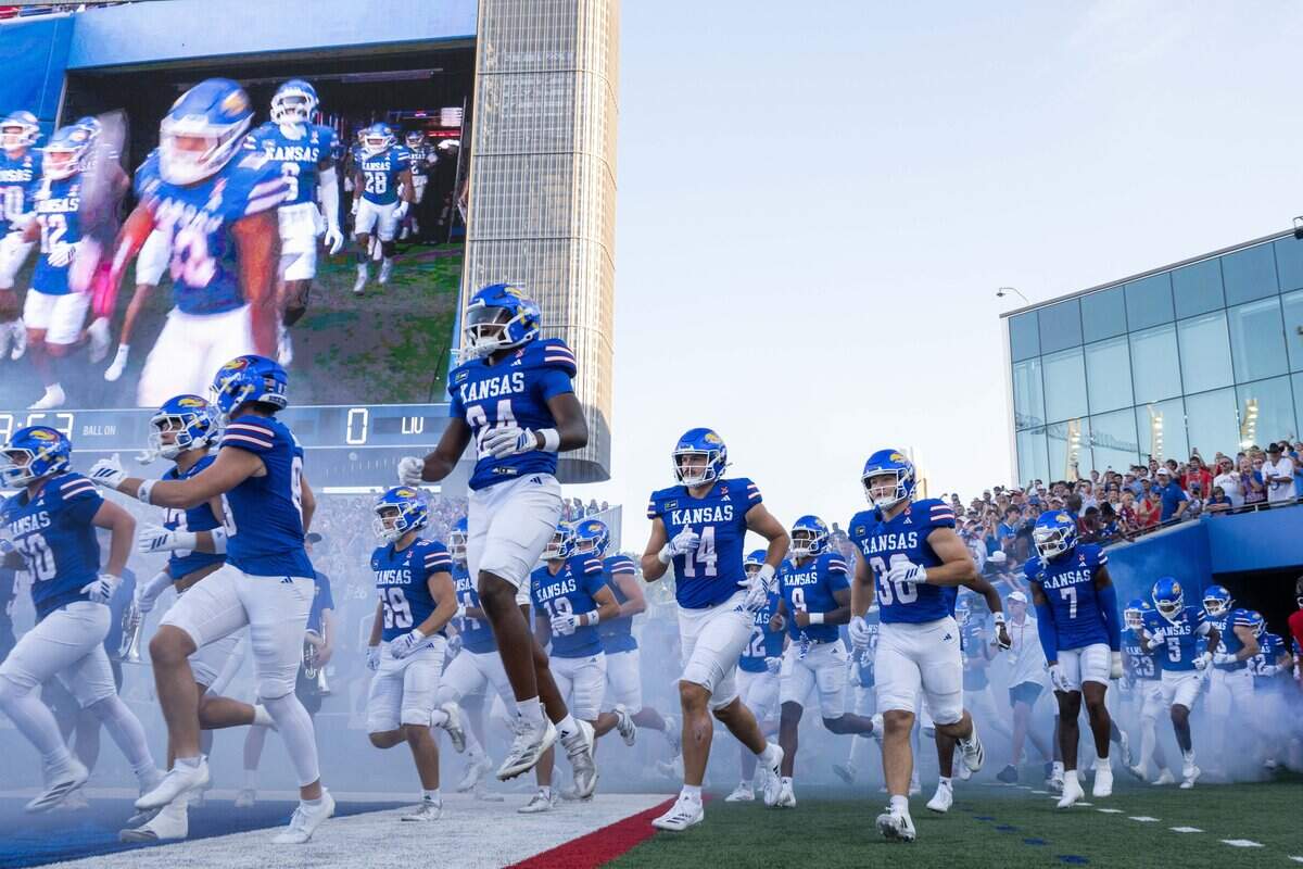 Kansas Jayhawks take the field prior to their game vs. Long Island University Sharks at David Booth Memorial Stadium on Friday, September 4, 2026, in Lawrence.