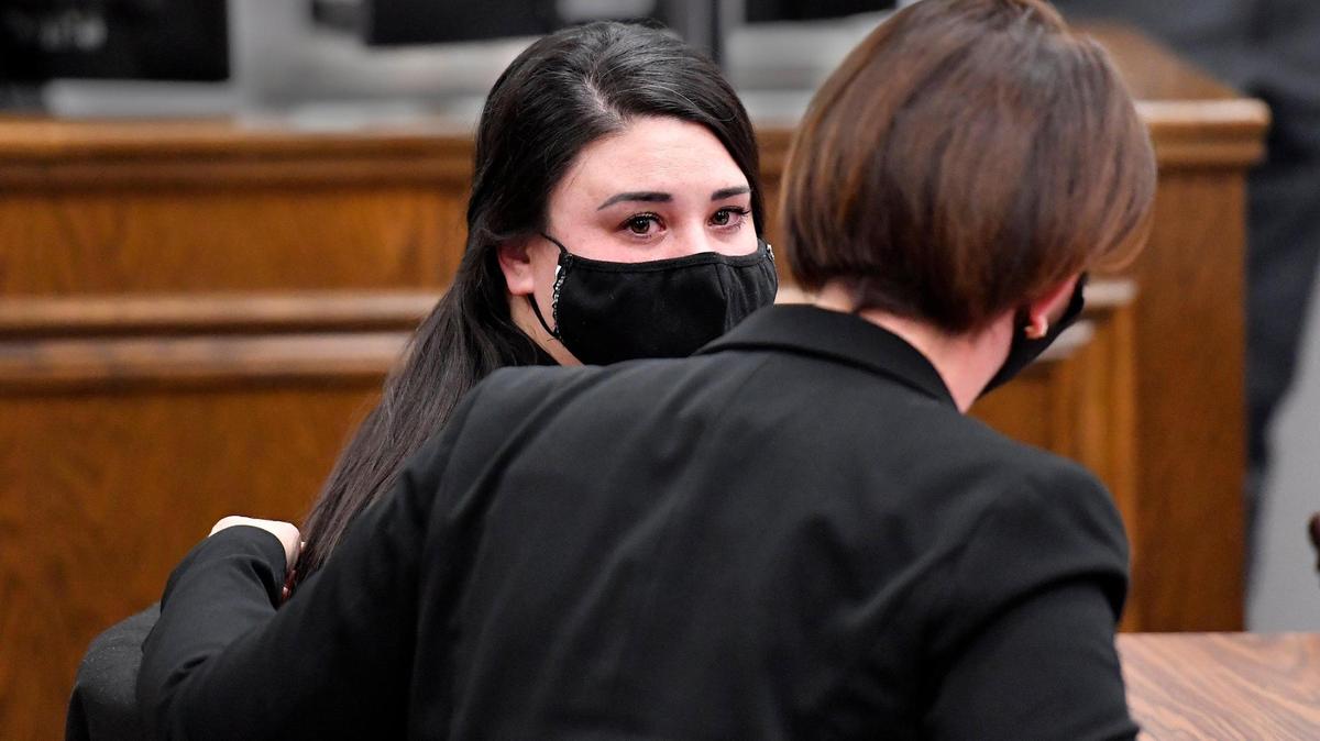 Lauren N. Michael, left, a former Jackson County sheriff’s deputy who shot a woman in the back in 2019 was sentenced to 180 days in jail. Michael appeared Thursday before Jackson County Circuit Court Judge Patrick Campbell. In January, Michael pleaded guilty to first-degree assault. The plea agreement called for a minimum of 120 days shock time in custody with three years probation and a six year suspended prison sentence.