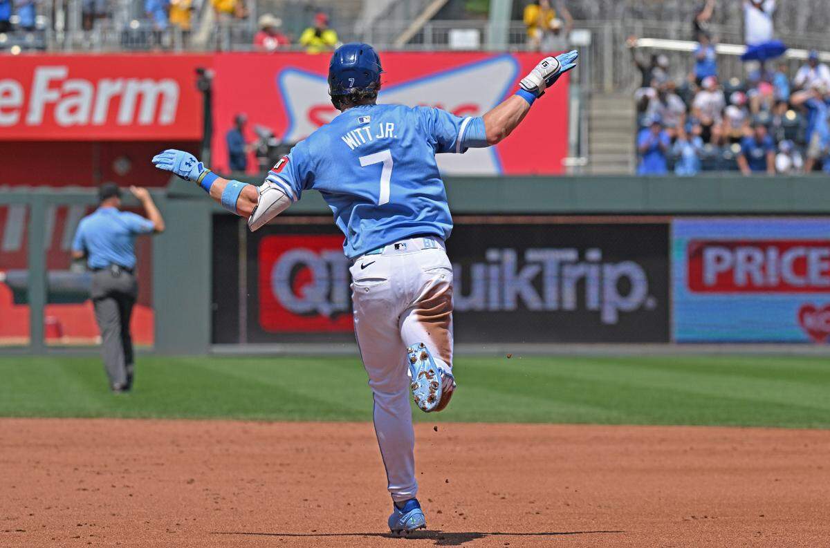 Kansas City Royals shortstop Bobby Witt Jr. flaps his arms as he rounds the bases after belting a solo home run to center in the third inning of Sunday’s game against the Philadelphia Phillies at Kauffman Stadium.