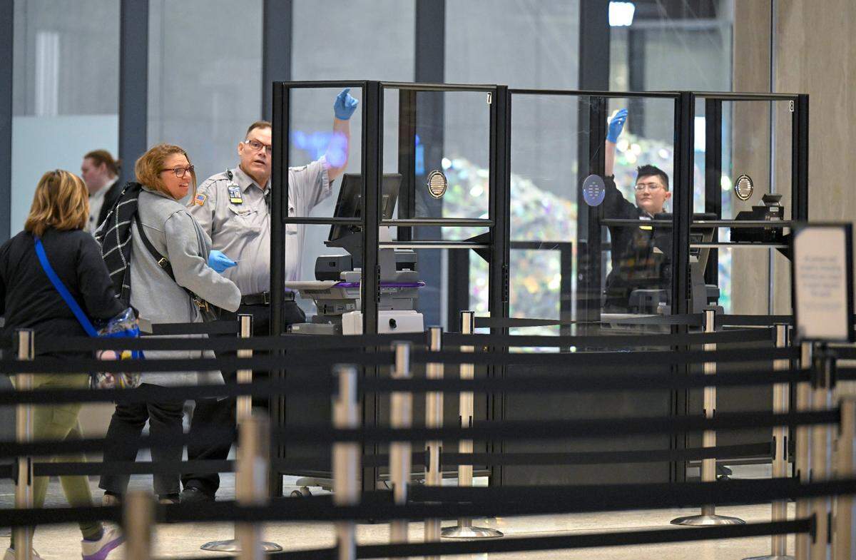 Travelers weaved their way to the security check in at the new $1.5 billion single terminal at Kansas City International Airport opened to travelers Tuesday, Feb. 28, 2023.