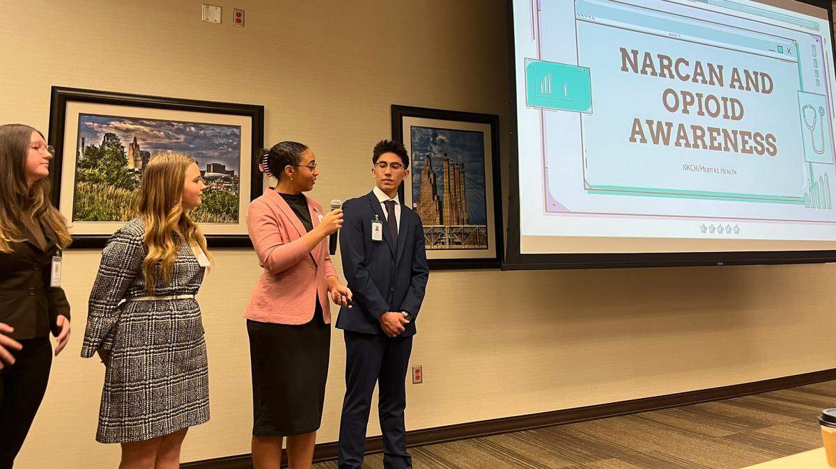 A group of North Kansas City high school students present their efforts to reduce the number of drug overdoses in the city at an event at the North Kansas City Hospital on Dec. 6.
