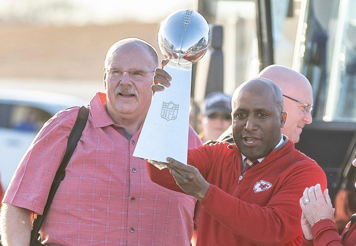 Kansas City Mayor Quinton Lucas holds up the Vince Lombardi Trophy after Chiefs coach Andy Reid handed it to him at Kansas City International Airport on Monday. The Kansas City Chiefs returned home after defeating the Philadelphia Eagles in Super Bowl LVII in Glendale, Ariz.
