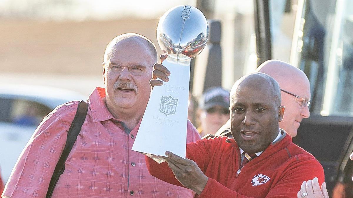 Kansas City Mayor Quinton Lucas holds up the Vince Lombardi Trophy after Chiefs coach Andy Reid handed it to him at Kansas City International Airport on Monday. The Kansas City Chiefs returned home after defeating the Philadelphia Eagles in Super Bowl LVII in Glendale, Ariz.