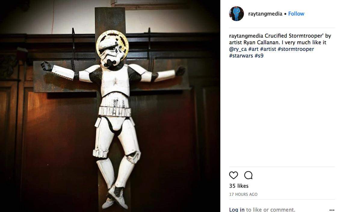 A London church heard so much criticism about an art sculpture of a crucified "Star Wars" Stormtrooper that it moved it to a less noticeable place for a current art exhibition.