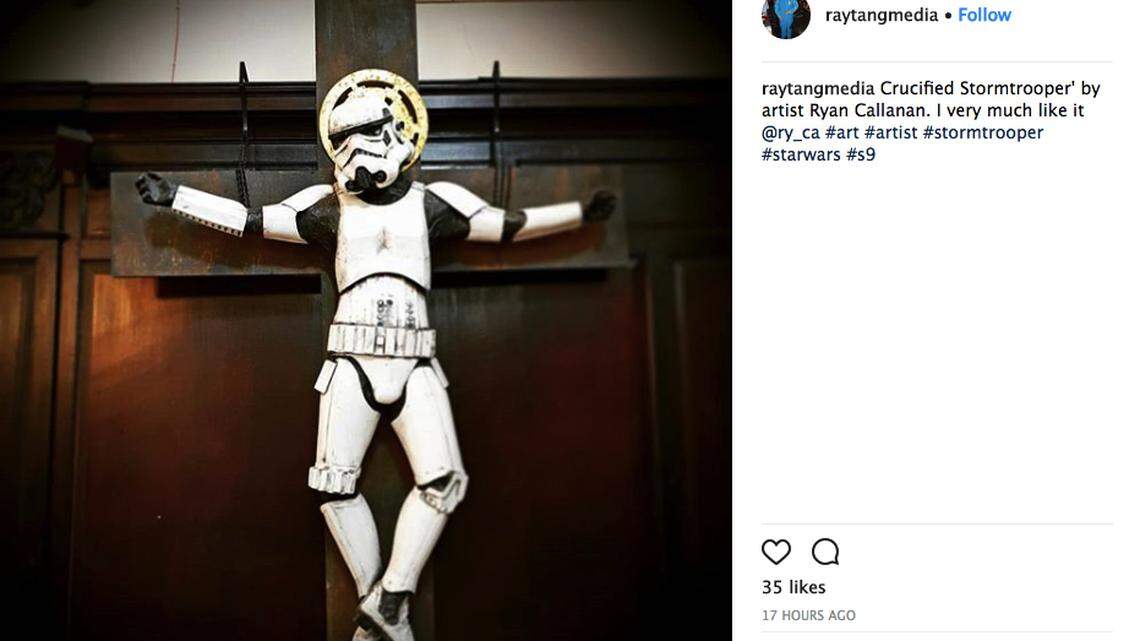 A London church heard so much criticism about an art sculpture of a crucified "Star Wars" Stormtrooper that it moved it to a less noticeable place for a current art exhibition.